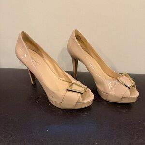 Cream buckle pumps